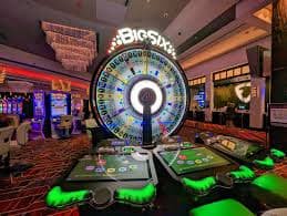 Live casino dealer table with roulette wheel on 3jl platform